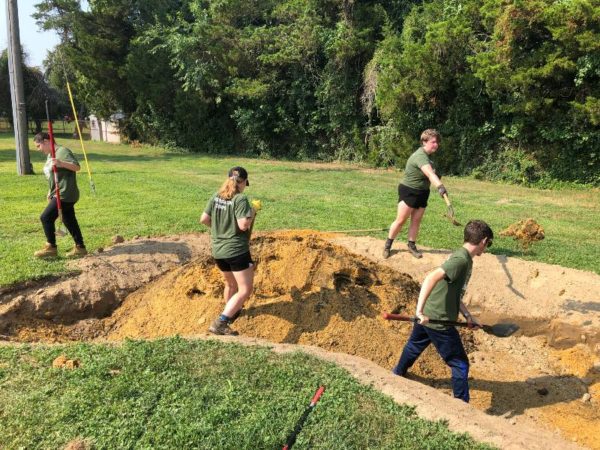 digging out a rain garden at indian avenue school