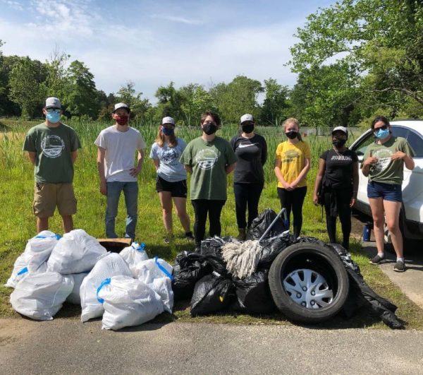 picking up trash in bridgeton on the group's first full day